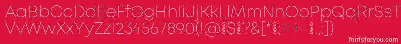 Шрифт MontExtralightdemo – розовые шрифты на красном фоне