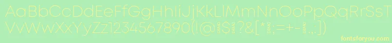 MontExtralightdemo Font – Yellow Fonts on Green Background