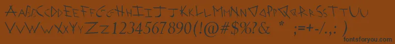 ArrowheadIShahaItalic-Schriftart – Schwarze Schriften auf braunem Hintergrund