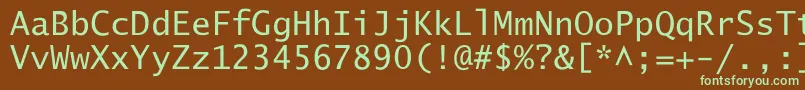 フォントLucidaSansTyp – 緑色の文字が茶色の背景にあります。