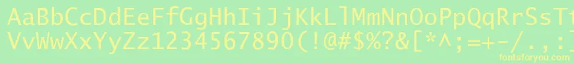 フォントLucidaSansTyp – 黄色の文字が緑の背景にあります