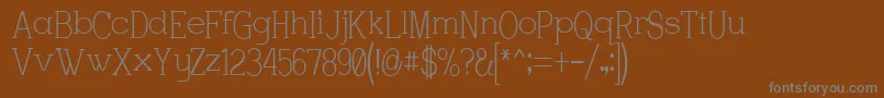 Шрифт Charstrwn – серые шрифты на коричневом фоне
