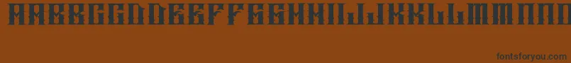 JakejarkorIngobernable Font – Black Fonts on Brown Background