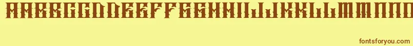 JakejarkorIngobernable Font – Brown Fonts on Yellow Background