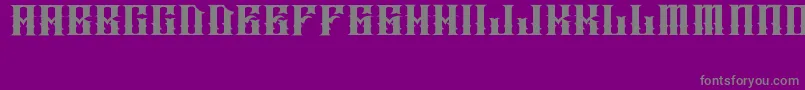 フォントJakejarkorIngobernable – 紫の背景に灰色の文字