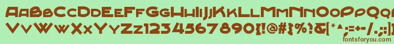 Junebugstompnf-fontti – ruskeat fontit vihreällä taustalla