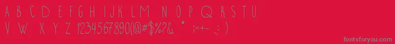 フォントNovito – 赤い背景に灰色の文字