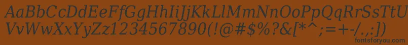 Шрифт DejavuSerifItalicCondensed – чёрные шрифты на коричневом фоне