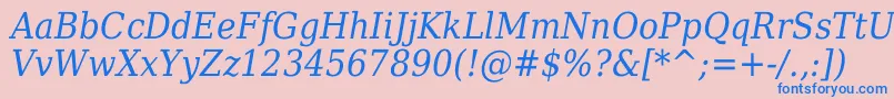 DejavuSerifItalicCondensed-fontti – siniset fontit vaaleanpunaisella taustalla