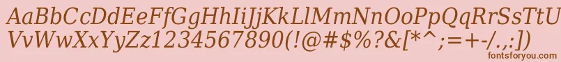 フォントDejavuSerifItalicCondensed – ピンクの背景に茶色のフォント
