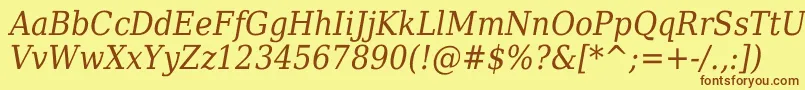 DejavuSerifItalicCondensed-Schriftart – Braune Schriften auf gelbem Hintergrund