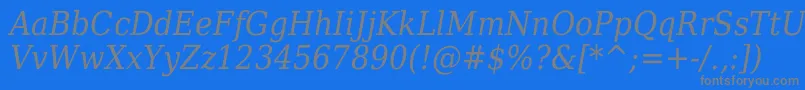 Czcionka DejavuSerifItalicCondensed – szare czcionki na niebieskim tle