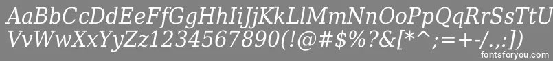 DejavuSerifItalicCondensed-fontti – valkoiset fontit harmaalla taustalla