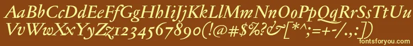 JannontextmedosfItalic-fontti – keltaiset fontit ruskealla taustalla