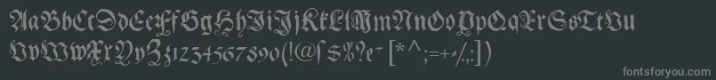 フォントGebetbuchfraktur – 黒い背景に灰色の文字