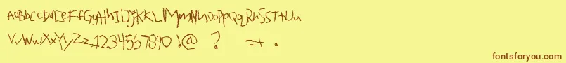 QuarterOz.ToFreedom-Schriftart – Braune Schriften auf gelbem Hintergrund