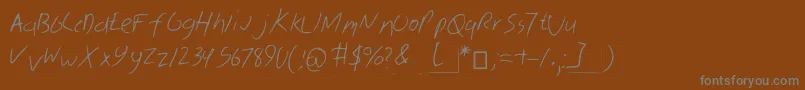 フォントSkribal – 茶色の背景に灰色の文字