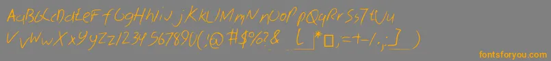 フォントSkribal – オレンジの文字は灰色の背景にあります。