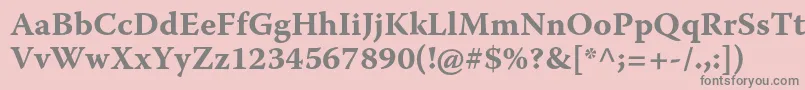 フォントWarnockproBoldcapt – ピンクの背景に灰色の文字