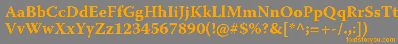 フォントWarnockproBoldcapt – オレンジの文字は灰色の背景にあります。