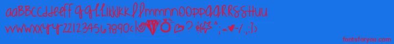 Kimmieshand Font – Red Fonts on Blue Background