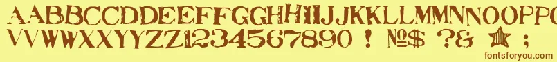 Stampede Font – Brown Fonts on Yellow Background