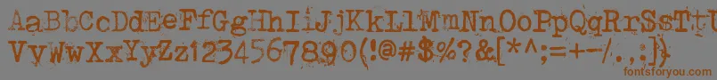 Punktype-Schriftart – Braune Schriften auf grauem Hintergrund