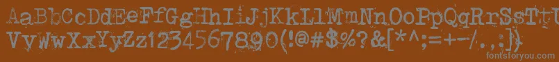 フォントPunktype – 茶色の背景に灰色の文字