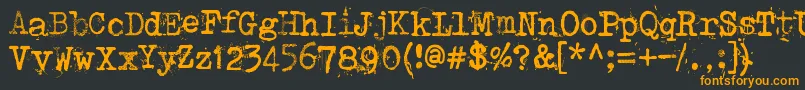 フォントPunktype – 黒い背景にオレンジの文字