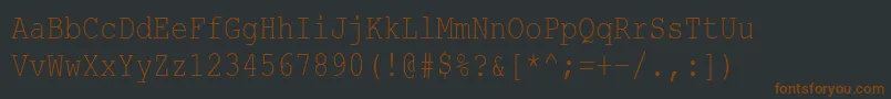 Czcionka CourierNewCyr80n – brązowe czcionki na czarnym tle