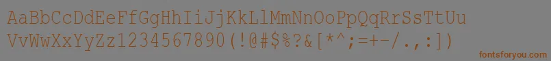 フォントCourierNewCyr80n – 茶色の文字が灰色の背景にあります。