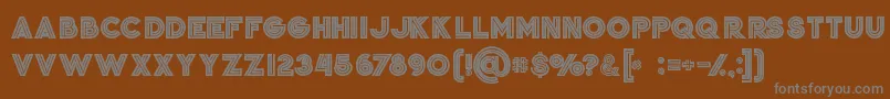Czcionka Jordanboldgrunge – szare czcionki na brązowym tle