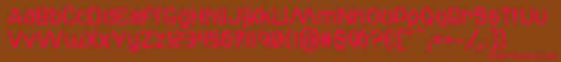 フォントBottix – 赤い文字が茶色の背景にあります。