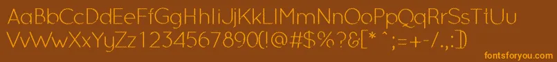 OcieLight Font – Orange Fonts on Brown Background