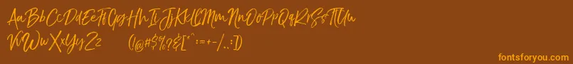 TheBraggestDemo Font – Orange Fonts on Brown Background
