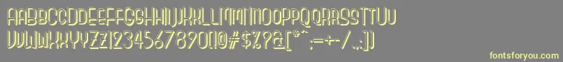 Monicas Salon Shadow Nf Font – Yellow Fonts on Gray Background