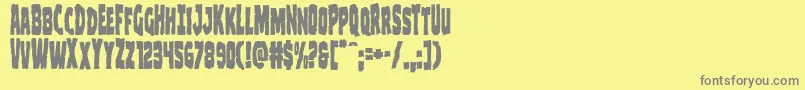 フォントClubberlangcond – 黄色の背景に灰色の文字