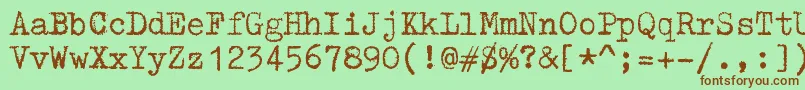Шрифт ZaiTriumphtypewriter – коричневые шрифты на зелёном фоне
