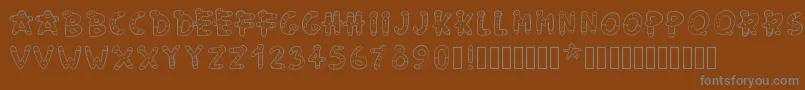 Шрифт Pwgingerbread – серые шрифты на коричневом фоне
