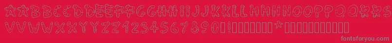 Pwgingerbread-Schriftart – Graue Schriften auf rotem Hintergrund