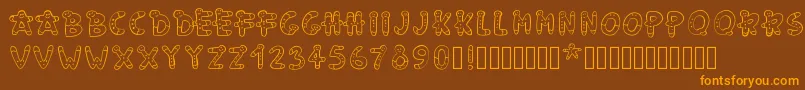 Pwgingerbread Font – Orange Fonts on Brown Background