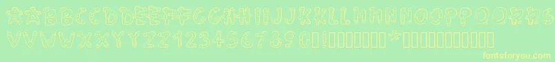 フォントPwgingerbread – 黄色の文字が緑の背景にあります