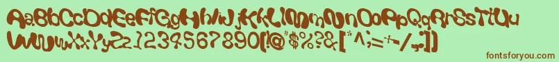 Giveandtake18RegularTtcon-fontti – ruskeat fontit vihreällä taustalla