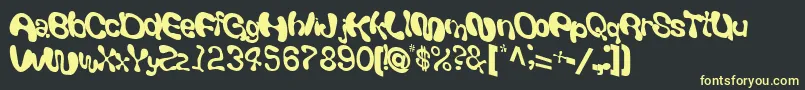 フォントGiveandtake18RegularTtcon – 黒い背景に黄色の文字