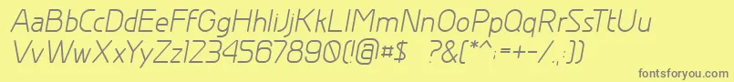 Fonte GreyscalebasicItalic – fontes cinzas em um fundo amarelo