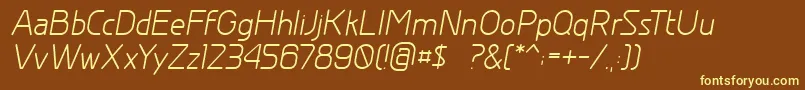 GreyscalebasicItalic-fontti – keltaiset fontit ruskealla taustalla