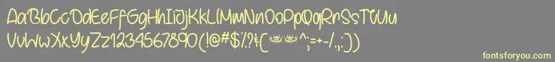 BehindBrownEyesTtf Font – Yellow Fonts on Gray Background