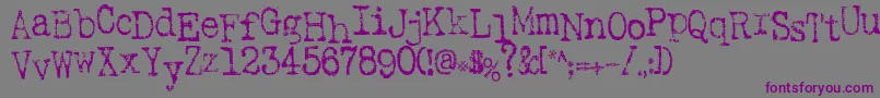 Inkspot-Schriftart – Violette Schriften auf grauem Hintergrund