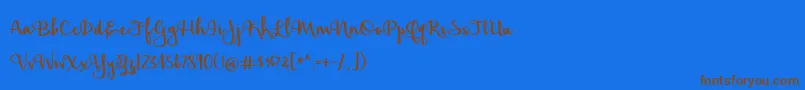 BmdHickoryJack-Schriftart – Braune Schriften auf blauem Hintergrund