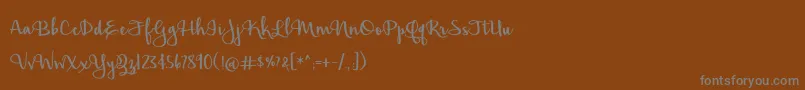 BmdHickoryJack Font – Gray Fonts on Brown Background